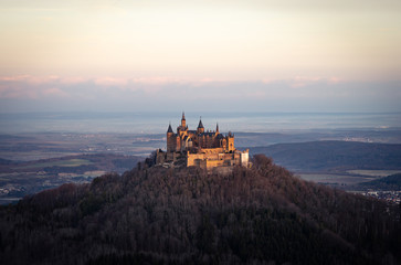 Fototapeta premium Medieval Hohenzollern Castle at the golden hour after sunrise