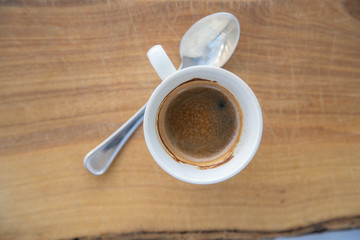 espresso cup on a wooden table taste and flavour of italy