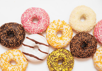 Delicious donuts on white color background.