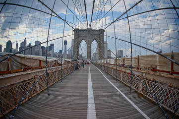 View Of Brooklyn Bridge Against Cloudy Sky