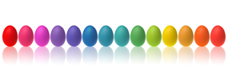 Easter eggs. Lined up with different colors on white background.