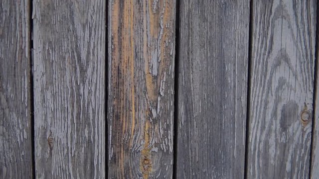 Panorama of an old wooden fence.