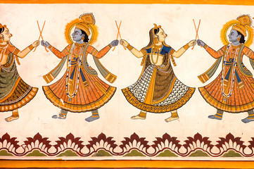 Dancing Krishna holding women hands in dance, fresco in Shekhawati region house
