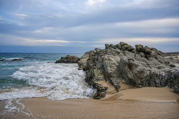 Waves at roky ocean beach