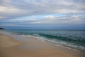 Fototapeta na wymiar Wave at sandy beach