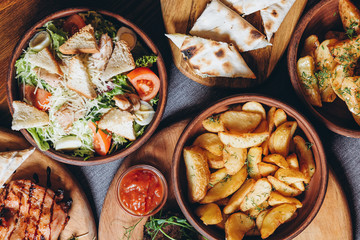 delicious European and Slavic cuisine on the big table waiting for guests. table with food, top view