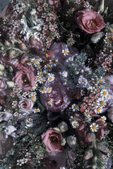 Colorful mixed bouquet with various spring flowers. Mixed flower arrangement: various flowers in...