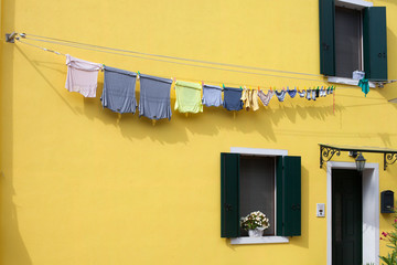 Clothes is drying on rope in Italian small city