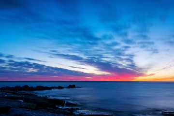 Obraz premium Cloudy sunset over the Baltic Sea at island of Gotland, Sweden