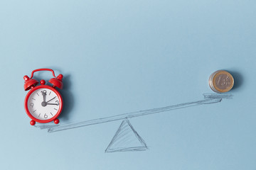 Time is money. Time is valuable resource. Time-limit. Lose money. Balance. Alarm-clock and coins on...
