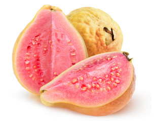 Isolated guava fruits. Pink guavas with yellow skin cut in halves isolated on white background with clipping path