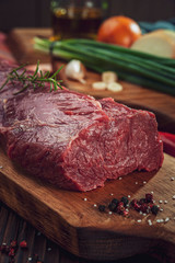 Raw beef tender loin with ingredients