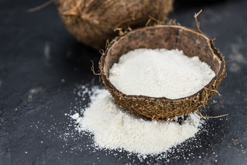 Portion of Coconut flour as detailed close-up shot; selective focus