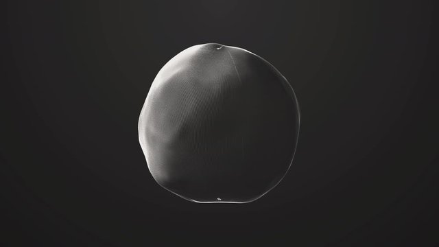 Changing the 3D sphere in space. The human cell on a black background is smoothly deformed and slowly rotates. An infected cell changes shape due to a coronavirus