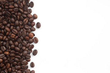 Roasted coffee beans isolated on white background with copy space,Top view.