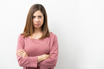 Fototapeta premium Angry brunette woman in a studio