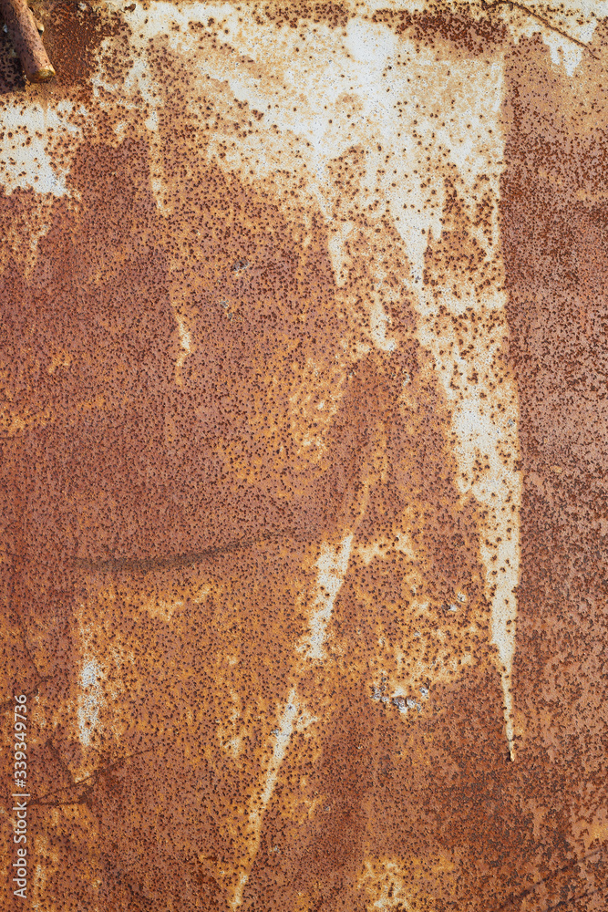 Wall mural old rusted metal texture. the surface of an uneven iron wall. perfect for background and grunge desi