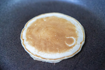 Pancake cooking on a pan