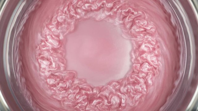 Rheoscopic fluid. Beautiful movement of particles in a liquid. Fantastic patterns and shapes.