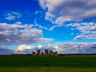 Fototapeta na wymiar Stonehenge an ancient prehistoric stone monument near Salisbury with dramatic sky, Wiltshire, UK. in England