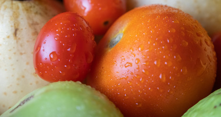 Mix fresh fruits on the table close up view. Selective focus.
