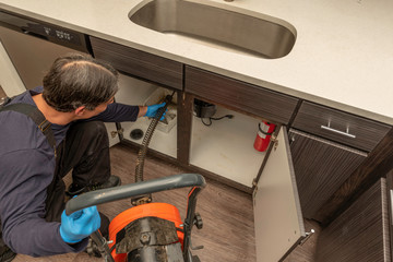 Main Drain Line Cleaning with Auger