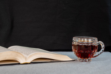 Cup of Coffee and an Open Book