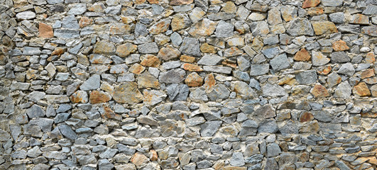 Stone background, texture of stone grey brick wall