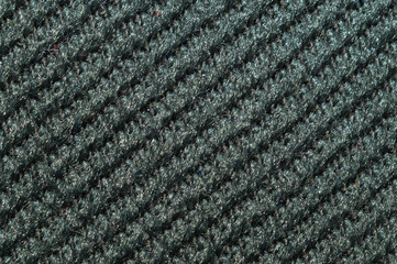 Black fabric texture. knitted textile background. woven material close up