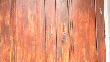 Fototapeta na wymiar vintage shutting wooden gate. Security of your life,