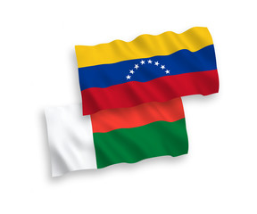 Flags of Venezuela and Madagascar on a white background