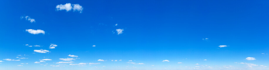 Blue Sky background with tiny Clouds. Panorama background