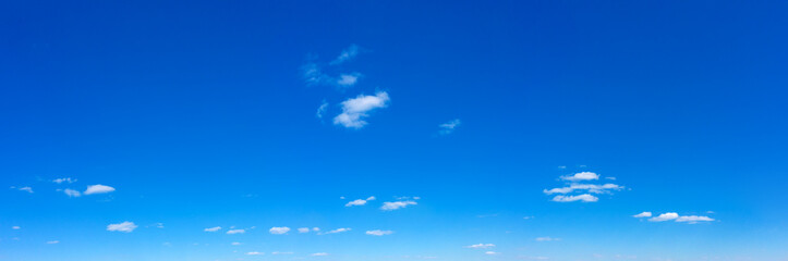 Blue Sky background with tiny Clouds. Panorama background