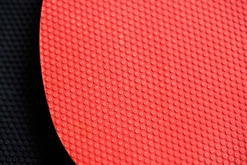 red and black ping pong racket background