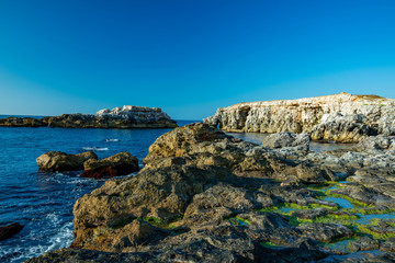 rocky and high with a blue sky
