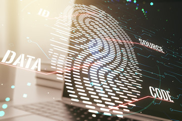 Multi exposure of creative fingerprint hologram on laptop background, personal biometric data...