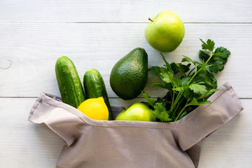 Grocery bag with healthy clean eating on a light background