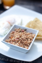 A typical Maldivian breakfast, Mas Huni, made with coconut and tuna.
