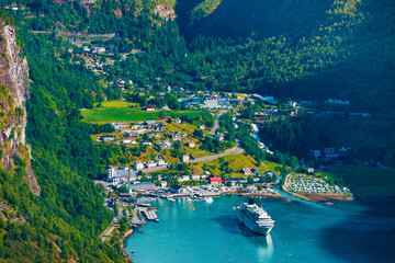 Cruise ship on fjord, Geiranger Norway.