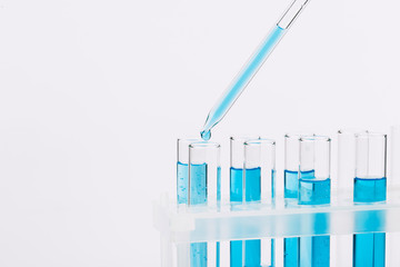 A pipette that adds fluid to one of several tubes. Lab tests