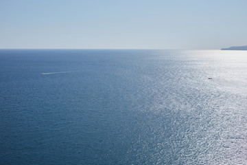 boat on the background of the blue sea