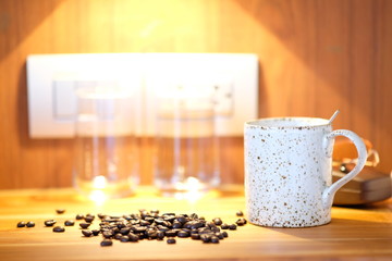 Coffee cup on wooden background and space for text 