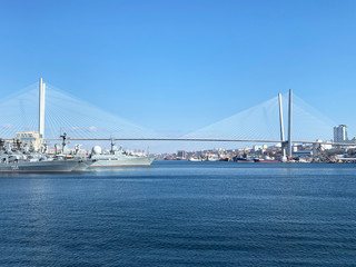 Vladivostok. Golden bridge-cable-stayed bridge over the Golden horn Bay in spring in sunny weather