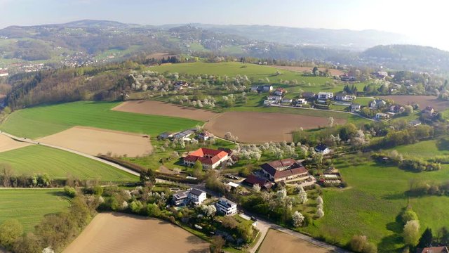 Aerial 4K footage of a village in Austria at beginning of spring