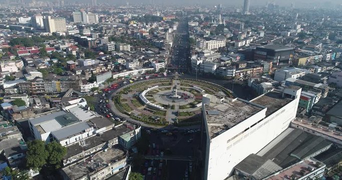 Bangkok city building circular junction traffic road with vehicle movement aerial view