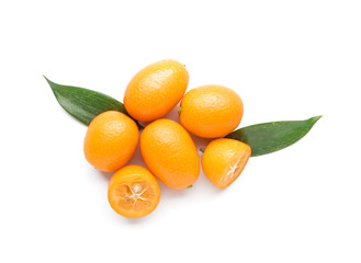 Tasty kumquat fruit on white background