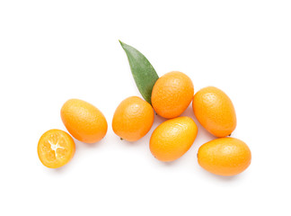 Fototapeta na wymiar Tasty kumquat fruit on white background