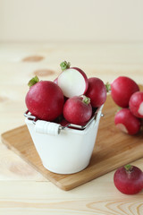 
radish in a white bucket