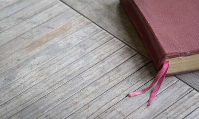 Top view Holy Bible with brown color cover on the wood table