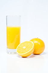 Oranges and juice on white background, healthy drinks, preventing coronavirus